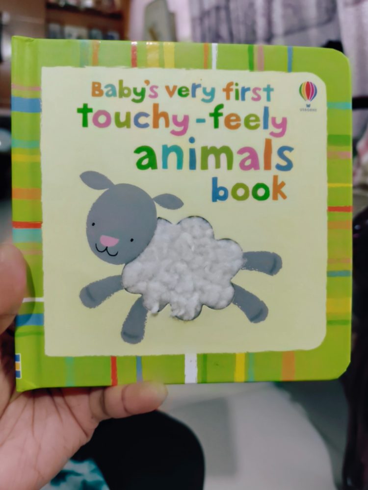 Baby's very first touchy-feely animals book